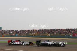 Valtteri Bottas (FIN) Williams FW35 and Jean-Eric Vergne (FRA) Scuderia Toro Rosso STR8 battle for position. 14.04.2013. Formula 1 World Championship, Rd 3, Chinese Grand Prix, Shanghai, China, Race Day.