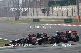 Romain Grosjean (FRA), Lotus F1 Team and Jean-Eric Vergne (FRA), Scuderia Toro Rosso   14.04.2013. Formula 1 World Championship, Rd 3, Chinese Grand Prix, Shanghai, China, Race Day.