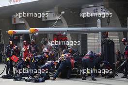 Sebastian Vettel (GER) Red Bull Racing pit stop  14.04.2013. Formula 1 World Championship, Rd 3, Chinese Grand Prix, Shanghai, China, Race Day.