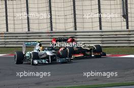 Lewis Hamilton (GBR), Mercedes Grand Prix and Kimi Raikkonen (FIN), Lotus F1 Team  14.04.2013. Formula 1 World Championship, Rd 3, Chinese Grand Prix, Shanghai, China, Race Day.