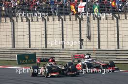 Kimi Raikkonen (FIN), Lotus F1 Team and Jenson Button (GBR), McLaren Mercedes  14.04.2013. Formula 1 World Championship, Rd 3, Chinese Grand Prix, Shanghai, China, Race Day.