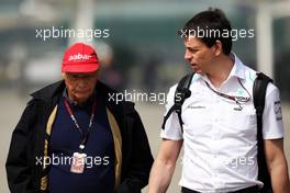 (L to R): Niki Lauda (AUT) Mercedes Non-Executive Chairman with Toto Wolff (GER) Mercedes AMG F1 Shareholder and Executive Director. 13.04.2013. Formula 1 World Championship, Rd 3, Chinese Grand Prix, Shanghai, China, Qualifying Day.
