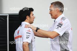(L to R): Sergio Perez (MEX) McLaren with Martin Whitmarsh (GBR) McLaren Chief Executive Officer. 13.04.2013. Formula 1 World Championship, Rd 3, Chinese Grand Prix, Shanghai, China, Qualifying Day.