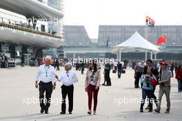 Bernie Ecclestone (GBR) CEO Formula One Group (FOM) with his fiance Fabiana Flosi (BRA) 13.04.2013. Formula 1 World Championship, Rd 3, Chinese Grand Prix, Shanghai, China, Qualifying Day.