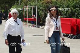 Bernie Ecclestone (GBR) CEO Formula One Group (FOM) and his fiance Fabiana Flosi (BRA). 14.04.2013. Formula 1 World Championship, Rd 3, Chinese Grand Prix, Shanghai, China, Race Day.