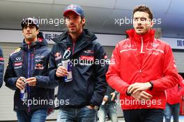 (L to R): Daniel Ricciardo (AUS) Red Bull Racing with Jean-Eric Vergne (FRA) Scuderia Toro Rosso and Jules Bianchi (FRA) Marussia F1 Team on the drivers parade. 20.04.2014. Formula 1 World Championship, Rd 4, Chinese Grand Prix, Shanghai, China, Race Day.