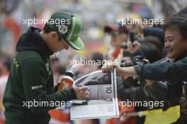 Kamui Kobayashi (JPN) Caterham on the drivers parade. 20.04.2014. Formula 1 World Championship, Rd 4, Chinese Grand Prix, Shanghai, China, Race Day.