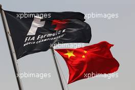 F1 and Chinese flags. 14.04.2013. Formula 1 World Championship, Rd 3, Chinese Grand Prix, Shanghai, China, Race Day.