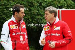 (L to R): Jonathan Giacobazzi (ITA) Ferrari Sponsorship Manager with Antonello Coletta (ITA) Ferrari Corse Clienti.  20.04.2014. Formula 1 World Championship, Rd 4, Chinese Grand Prix, Shanghai, China, Race Day.
