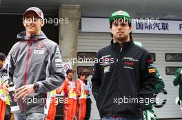 (L to R): Esteban Gutierrez (MEX) Sauber with Sergio Perez (MEX) Sahara Force India F1 on the drivers parade. 20.04.2014. Formula 1 World Championship, Rd 4, Chinese Grand Prix, Shanghai, China, Race Day.