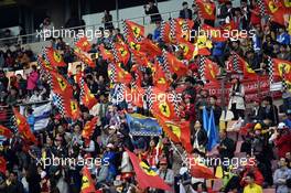 Ferrari fans and flags. 20.04.2014. Formula 1 World Championship, Rd 4, Chinese Grand Prix, Shanghai, China, Race Day.