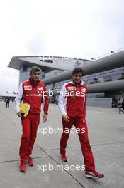 (L to R): Marco Mattiacci (ITA) Ferrari Team Principal with Massimo Rivola (ITA) Ferrari Sporting Director. 20.04.2014. Formula 1 World Championship, Rd 4, Chinese Grand Prix, Shanghai, China, Race Day.