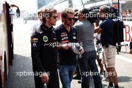 (L to R): Romain Grosjean (FRA) Lotus F1 Team and Jean-Eric Vergne (FRA) Scuderia Toro Rosso on the drivers parade. 14.04.2013. Formula 1 World Championship, Rd 3, Chinese Grand Prix, Shanghai, China, Race Day.