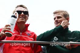 (L to R): Max Chilton (GBR) Marussia F1 Team with Marcus Ericsson (SWE) Caterham on the drivers parade. 20.04.2014. Formula 1 World Championship, Rd 4, Chinese Grand Prix, Shanghai, China, Race Day.