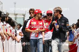 (L to R): Felipe Massa (BRA) Ferrari and Sebastian Vettel (GER) Red Bull Racing on the drivers parade. 14.04.2013. Formula 1 World Championship, Rd 3, Chinese Grand Prix, Shanghai, China, Race Day.