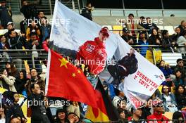 Flags for Michael Schumacher (GER) and Sebastian Vettel (GER) Red Bull Racing. 20.04.2014. Formula 1 World Championship, Rd 4, Chinese Grand Prix, Shanghai, China, Race Day.