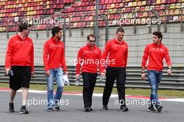 Rodolfo Gonzalez (VEN) Marussia F1 Team Reserve Driver pand Jules Bianchi (FRA) Marussia F1 Team walk the circuit. 11.04.2013. Formula 1 World Championship, Rd 3, Chinese Grand Prix, Shanghai, China, Preparation Day.