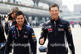 Mark Webber (AUS) Red Bull Racing with his personal trainer Richard Conner (AUS). 11.04.2013. Formula 1 World Championship, Rd 3, Chinese Grand Prix, Shanghai, China, Preparation Day.