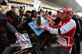 Felipe Massa (BRA) Ferrari signs autographs for the fans. 11.04.2013. Formula 1 World Championship, Rd 3, Chinese Grand Prix, Shanghai, China, Preparation Day.