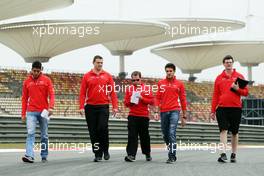 Rodolfo Gonzalez (VEN) Marussia F1 Team Reserve Driver (Left) and Jules Bianchi (FRA) Marussia F1 Team walk the circuit. 11.04.2013. Formula 1 World Championship, Rd 3, Chinese Grand Prix, Shanghai, China, Preparation Day.