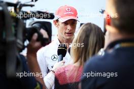 Jenson Button (GBR) McLaren with the media. 11.04.2013. Formula 1 World Championship, Rd 3, Chinese Grand Prix, Shanghai, China, Preparation Day.
