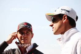 (L to R): Nico Hulkenberg (GER) Sauber with Adrian Sutil (GER) Sahara Force India F1. 11.04.2013. Formula 1 World Championship, Rd 3, Chinese Grand Prix, Shanghai, China, Preparation Day.