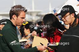 Giedo van der Garde (NLD) Caterham F1 Team signs autographs for the fans. 11.04.2013. Formula 1 World Championship, Rd 3, Chinese Grand Prix, Shanghai, China, Preparation Day.