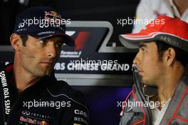 (L to R): Mark Webber (AUS) Red Bull Racing and Sergio Perez (MEX) McLaren in the FIA Press Conference. 11.04.2013. Formula 1 World Championship, Rd 3, Chinese Grand Prix, Shanghai, China, Preparation Day.