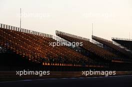 The sun sets on a track grandstand. 11.04.2013. Formula 1 World Championship, Rd 3, Chinese Grand Prix, Shanghai, China, Preparation Day.