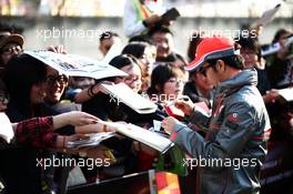 Sergio Perez (MEX) McLaren signs autographs for the fans. 11.04.2013. Formula 1 World Championship, Rd 3, Chinese Grand Prix, Shanghai, China, Preparation Day.