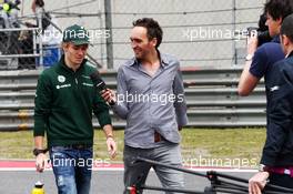 Charles Pic (FRA) Caterham and Franck Montagny (FRA) Canal+ TV Presenter walk the circuit. 11.04.2013. Formula 1 World Championship, Rd 3, Chinese Grand Prix, Shanghai, China, Preparation Day.