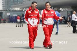 (L to R): Andrea Stella (ITA) Ferrari Race Engineer with Hirohide Hamashima (JPN) Ferrari Tyre Engineer. 11.04.2013. Formula 1 World Championship, Rd 3, Chinese Grand Prix, Shanghai, China, Preparation Day.