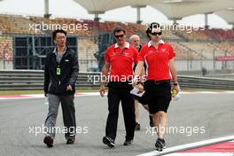 (L to R): Graeme Lowdon (GBR) Marussia F1 Team Chief Executive Officer and Marc Hynes (GBR) Marussia F1 Team Driver Coach walk the circuit. 11.04.2013. Formula 1 World Championship, Rd 3, Chinese Grand Prix, Shanghai, China, Preparation Day.
