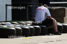 McLaren mechanic with Pirelli tyres. 11.04.2013. Formula 1 World Championship, Rd 3, Chinese Grand Prix, Shanghai, China, Preparation Day.