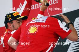 Race winner Fernando Alonso (ESP) Ferrari celebrates on the podium with Stefano Domenicali (ITA) Ferrari General Director. 12.05.2013. Formula 1 World Championship, Rd 5, Spanish Grand Prix, Barcelona, Spain, Race Day
