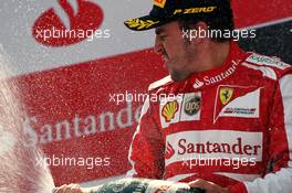 Race winner Fernando Alonso (ESP) Ferrari celebrates on the podium. 12.05.2013. Formula 1 World Championship, Rd 5, Spanish Grand Prix, Barcelona, Spain, Race Day