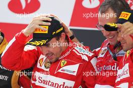 The podium (L to R): Fernando Alonso (ESP) Ferrari, race winner; Stefano Domenicali (ITA) Ferrari General Director; Felipe Massa (BRA) Ferrari, third. 12.05.2013. Formula 1 World Championship, Rd 5, Spanish Grand Prix, Barcelona, Spain, Race Day