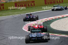 Nico Rosberg (GER) Mercedes AMG F1 W04 leads Sebastian Vettel (GER) Red Bull Racing RB9, Fernando Alonso (ESP) Ferrari F138 and Lewis Hamilton (GBR) Mercedes AMG F1 W04. 12.05.2013. Formula 1 World Championship, Rd 5, Spanish Grand Prix, Barcelona, Spain, Race Day