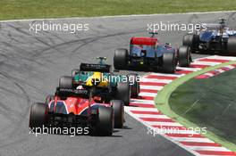 Valtteri Bottas (FIN) Williams FW35; Jenson Button (GBR) McLaren MP4-28; and Giedo van der Garde (NLD) Caterham CT03. 12.05.2013. Formula 1 World Championship, Rd 5, Spanish Grand Prix, Barcelona, Spain, Race Day