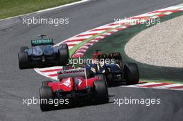 Lewis Hamilton (GBR) Mercedes AMG F1 W04 leads Kimi Raikkonen (FIN) Lotus F1 E21 and Felipe Massa (BRA) Ferrari F138. 12.05.2013. Formula 1 World Championship, Rd 5, Spanish Grand Prix, Barcelona, Spain, Race Day