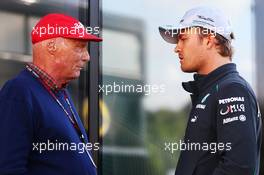 (L to R): Niki Lauda (AUT) Mercedes Non-Executive Chairman with Nico Rosberg (GER) Mercedes AMG F1. 11.05.2013. Formula 1 World Championship, Rd 5, Spanish Grand Prix, Barcelona, Spain, Qualifying Day