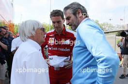 (L to R): Bernie Ecclestone (GBR) CEO Formula One Group (FOM) with Renato Bisignani (ITA) Ferrari Head of Communications and Maurizio Arrivabene (ITA) Marlboro Europe Brand Manager. 11.05.2013. Formula 1 World Championship, Rd 5, Spanish Grand Prix, Barcelona, Spain, Qualifying Day