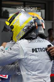 (L to R): Lewis Hamilton (GBR) Mercedes AMG F1 with pole sitter Nico Rosberg (GER) Mercedes AMG F1 in parc ferme. 11.05.2013. Formula 1 World Championship, Rd 5, Spanish Grand Prix, Barcelona, Spain, Qualifying Day