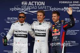 Qualifying top three in parc ferme (L to R): Lewis Hamilton (GBR) Mercedes AMG F1, second; Nico Rosberg (GER) Mercedes AMG F1, pole position; Sebastian Vettel (GER) Red Bull Racing, third. 11.05.2013. Formula 1 World Championship, Rd 5, Spanish Grand Prix, Barcelona, Spain, Qualifying Day