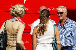 John Button (GBR) with Karin Asplund (SWE) (Left). 11.05.2013. Formula 1 World Championship, Rd 5, Spanish Grand Prix, Barcelona, Spain, Qualifying Day
