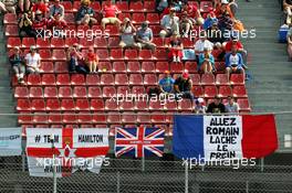 Fans and flags in the grandstand. 11.05.2013. Formula 1 World Championship, Rd 5, Spanish Grand Prix, Barcelona, Spain, Qualifying Day