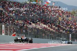 Lewis Hamilton (GBR) Mercedes AMG F1 W04 leads Adrian Sutil (GER) Sahara Force India VJM06. 11.05.2013. Formula 1 World Championship, Rd 5, Spanish Grand Prix, Barcelona, Spain, Qualifying Day