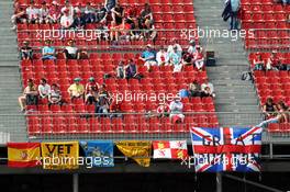 Fans and flags in the grandstand. 11.05.2013. Formula 1 World Championship, Rd 5, Spanish Grand Prix, Barcelona, Spain, Qualifying Day