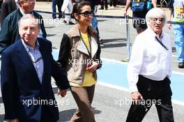 (L to R): Jean Todt (FRA) FIA President with Michelle Yeoh (MAL) and Bernie Ecclestone (GBR) CEO Formula One Group (FOM). 12.05.2013. Formula 1 World Championship, Rd 5, Spanish Grand Prix, Barcelona, Spain, Race Day