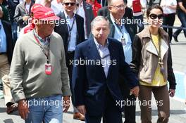 (L to R): Niki Lauda (AUT) Mercedes Non-Executive Chairman with Jean Todt (FRA) FIA President and Michelle Yeoh (MAL). 12.05.2013. Formula 1 World Championship, Rd 5, Spanish Grand Prix, Barcelona, Spain, Race Day
